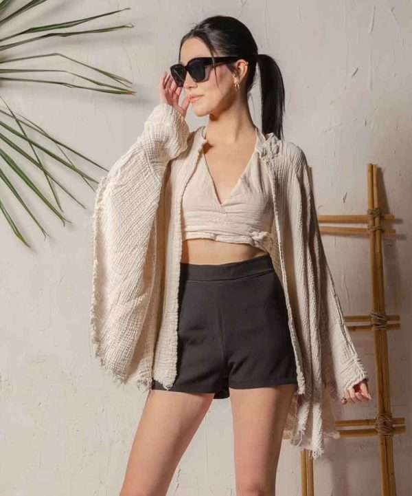 Image of a cream colored boho muslim kimono poncho product